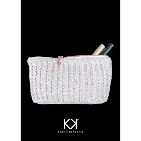 Lille hæklet pung med reliefstangmasker - Trykt opskrift