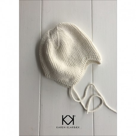 Opskrift på strikket djævlehue. Farvetryk i postkortstørrelse.